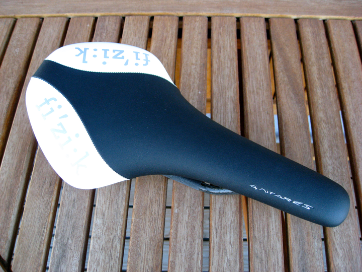 Black and white Fizik Antares R1 with carbon rails.